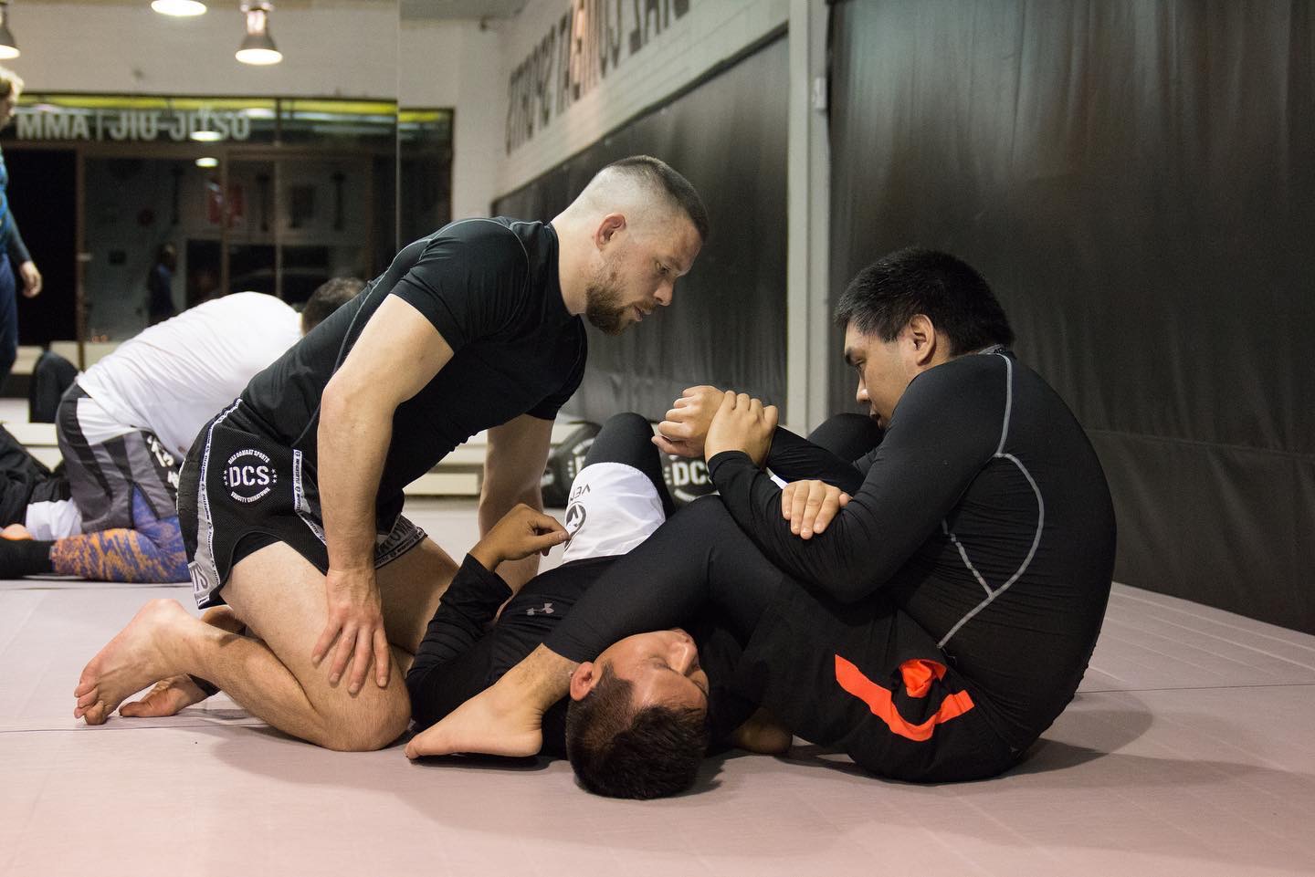 Learning the move of the day at jiu-jitsu class in Vancouver